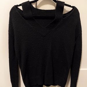 Decker black sweater.Sheer arms. Cold Shoulder.